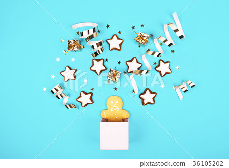 Gingerbread man in a pink box.  36105202