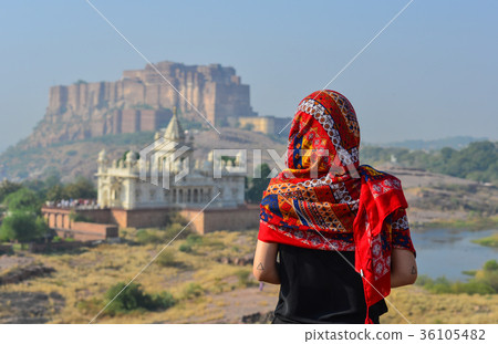 Young woman standing on the hill 36105482