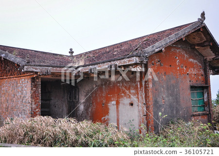 Old temple with grass 36105721