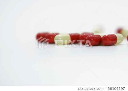 Capsule pills on white background 36106297