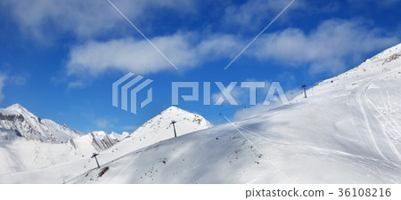 Panoramic view on off-piste slope and chair-lift Panoramic view on off-piste slope and chair-lift 36108216