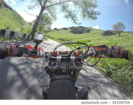 Enduro journey with dirt bike high in the 36109704