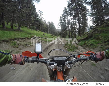 Enduro journey with dirt bike high in the 36109773