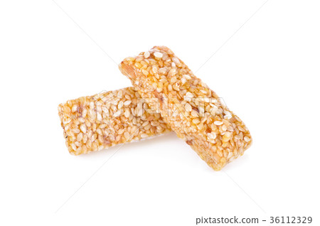 stack of sweetened white sesame stick on white stack of sweetened white sesame stick on white 36112329