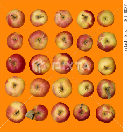 A lot of ripe red apples on an orange background A lot of ripe red apples on an orange background 36118027