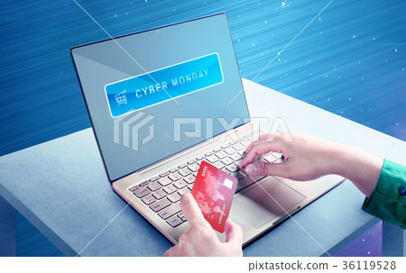 Hands using laptop and credit card 36119528
