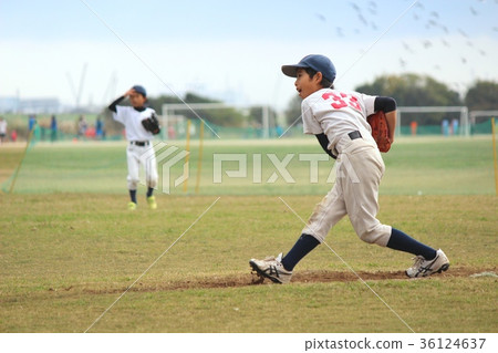 Baseball boy doing throwing practice at break time 36124637
