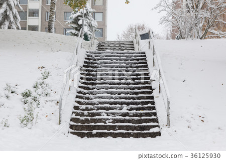 Slippery stairs after first snow in park 36125930