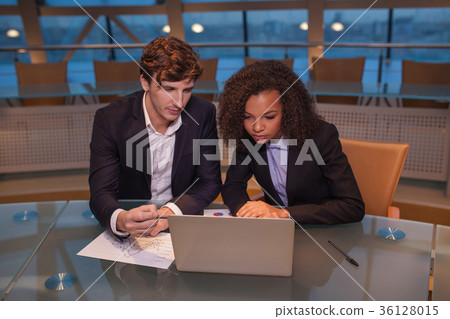 Business people having meeting around table in Business people having meeting around table in 36128015
