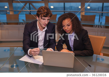 Business people having meeting around table in Business people having meeting around table in 36128016
