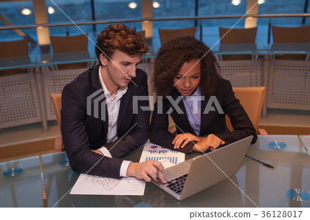Business people having meeting around table in Business people having meeting around table in 36128017