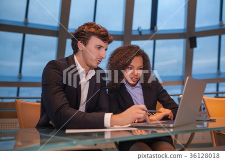 Business people having meeting around table in Business people having meeting around table in 36128018
