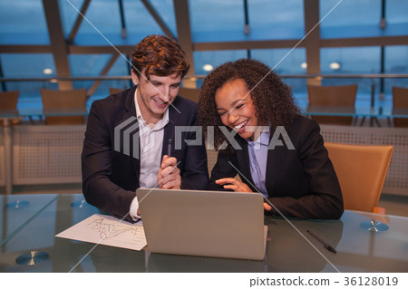 Business people having meeting around table in Business people having meeting around table in 36128019
