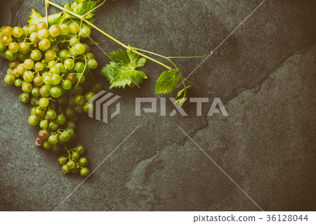 Grape and corkscrews wine concept, Stone Grape and corkscrews wine concept, Stone 36128044