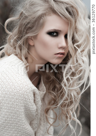 beautiful young  blonde woman with blue eyes 36129770
