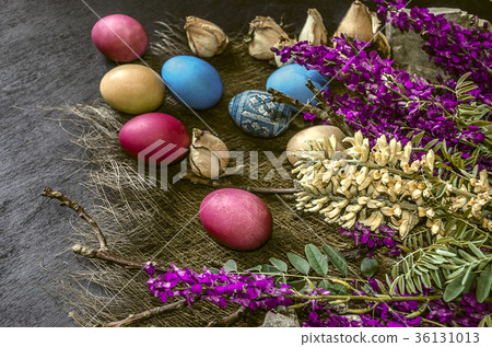Wild flowers and colored Easter eggs Wild flowers and colored Easter eggs 36131013