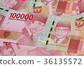 100,000 Rupiah bills 36135572
