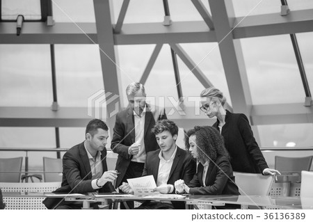Group of business people having meeting together Group of business people having meeting together 36136389