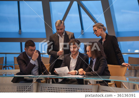 Group of business people having meeting together 36136391