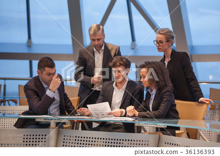 Group of business people having meeting together Group of business people having meeting together 36136393