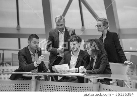 Group of business people having meeting together 36136394