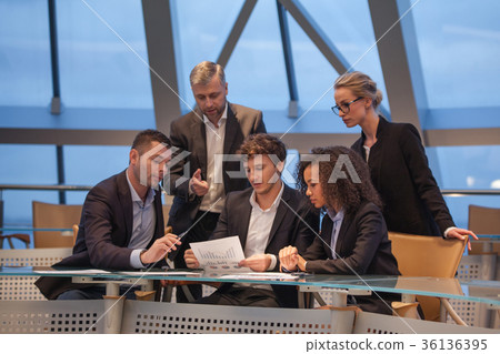 Group of business people having meeting together Group of business people having meeting together 36136395