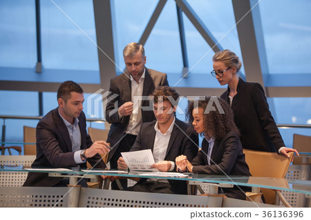 Group of business people having meeting together 36136396