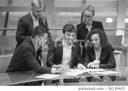 Group of business people having meeting together 36136403