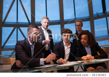 Group of business people having meeting together Group of business people having meeting together 36136465