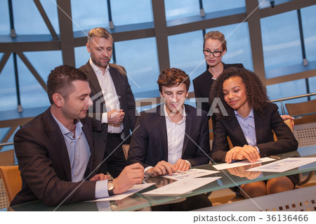 Group of business people having meeting together Group of business people having meeting together 36136466