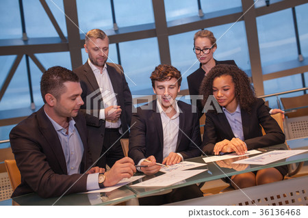 Group of business people having meeting together Group of business people having meeting together 36136468