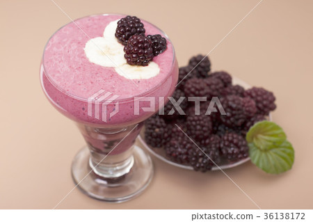 Cocktail of frozen blackberries with yogurt . Cocktail of frozen blackberries with yogurt . 36138172
