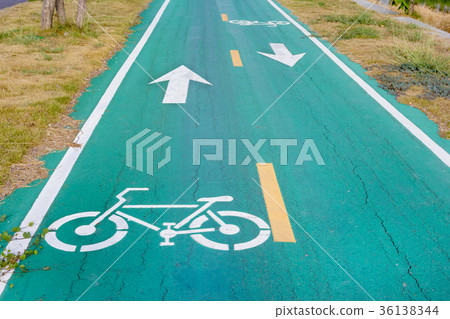 Bicycle symbol on city street 36138344