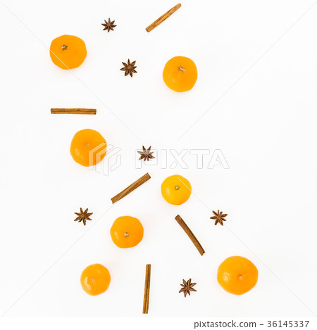 Fresh citrus and cinnamon with anise on white Fresh citrus and cinnamon with anise on white 36145337