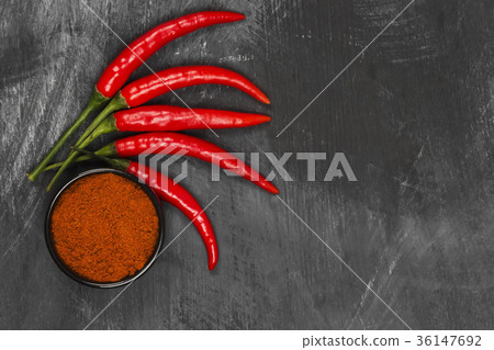 Red hot pepper on a black background. Top view Red hot pepper on a black background. Top view 36147692
