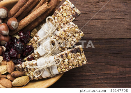 Cereal bars with nuts, berries and cinnamon 36147708