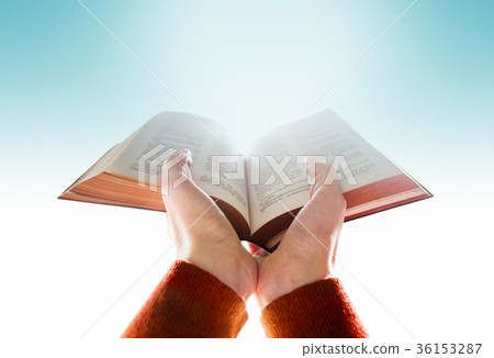 Hands of Woman Raise up a Bible for Praying Hands of Woman Raise up a Bible for Praying 36153287