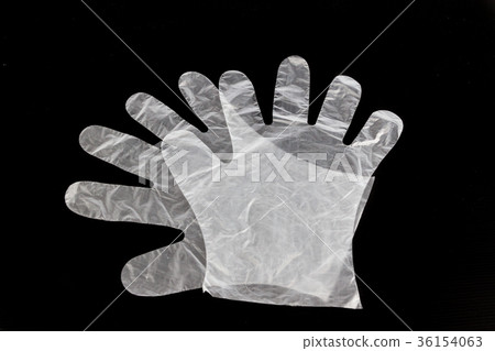 Pair of PVC disposable gloves on dark background 36154063