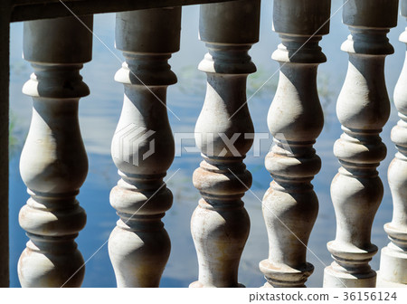 The old balustrades made by white cement closeup The old balustrades made by white cement closeup 36156124