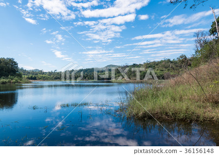 Beautiful white clouds against the blue sky 36156148