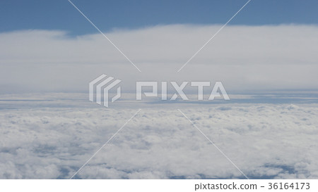 aerial shot from plane flying above the clouds in aerial shot from plane flying above the clouds in 36164173