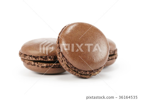 three chocolate macarons isolated on white three chocolate macarons isolated on white 36164535