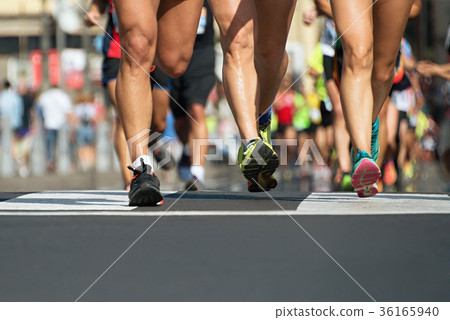 Marathon running in the light of evening Marathon running in the light of evening 36165940
