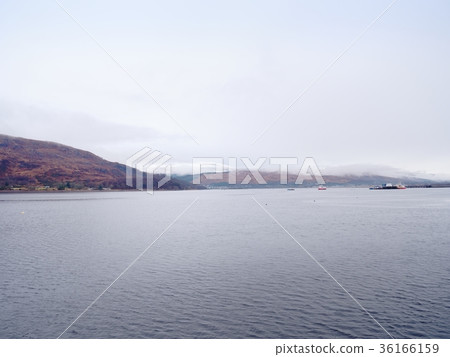 Mountain lake before sunset in Higland in Scotland Mountain lake before sunset in Higland in Scotland 36166159