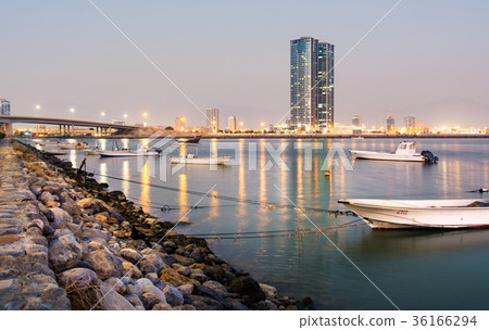 Ras Al Khaimah creek with city view at dusk Ras Al Khaimah creek with city view at dusk 36166294