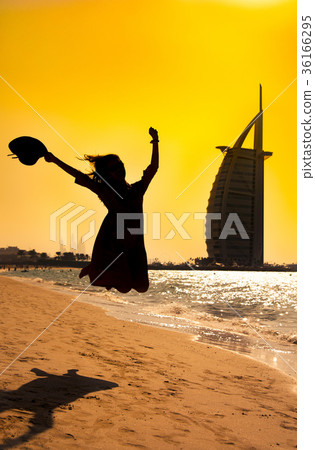 Happy girl at the famous beach in Dubai 36166295