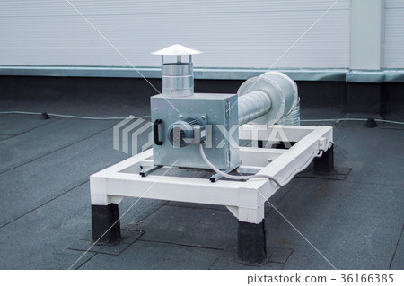Gray centrifugal fan with ductwork on the roof ot 36166385