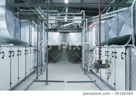 Two gray industrial air handling units in the 36166389