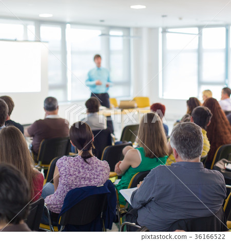 Speaker giving presentation on business conference Speaker giving presentation on business conference 36166522