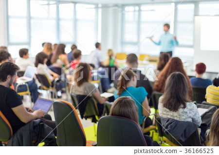 Speaker giving presentation on business conference Speaker giving presentation on business conference 36166525